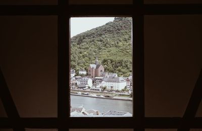 View of cityscape through window