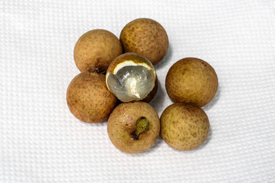 Close-up of eggs against white background