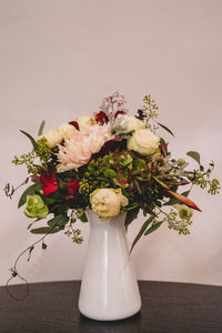 Close-up of flower vase on table