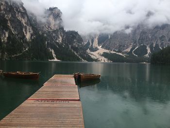 Boat on lake against mountains