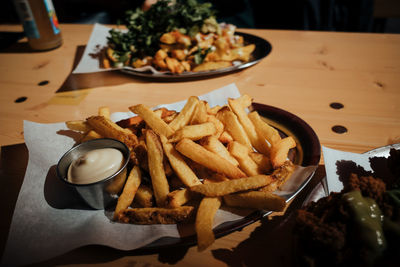 High angle view of french fries served on table