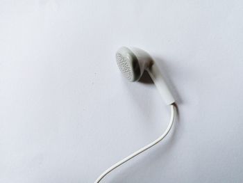 High angle view of piano on white table