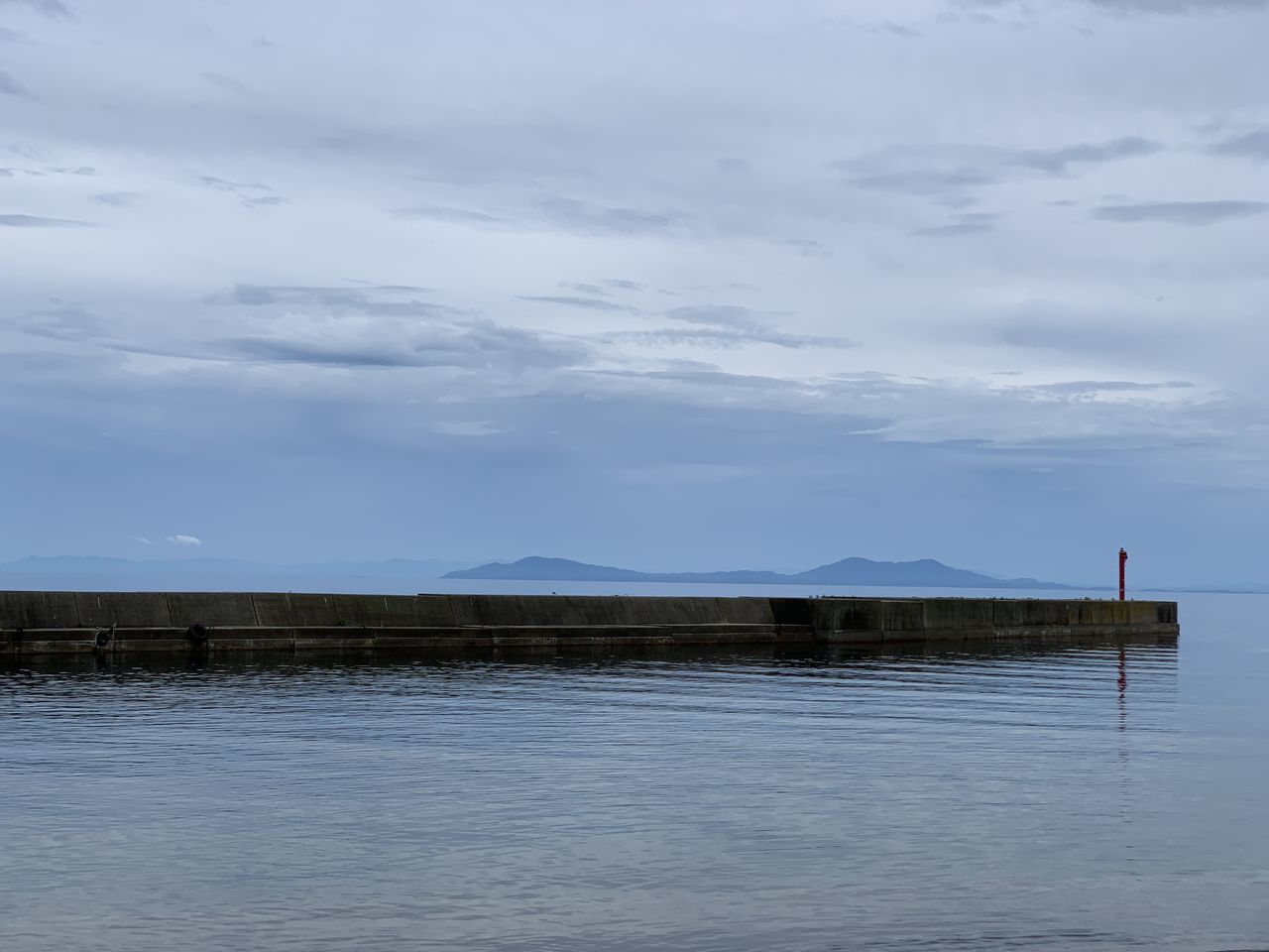 VIEW OF LAKE AGAINST SKY