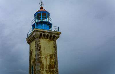 Low angle view of lighthouse against sky