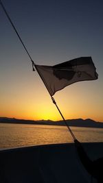 Cropped image of boat at sunset