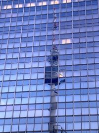 Low angle view of modern glass building