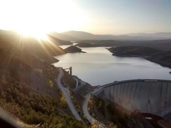 El atazar dam against sky during sunny day