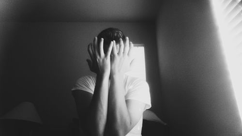 Close-up of woman in room