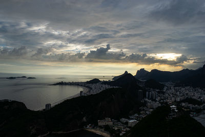 High angle view of town at sunset