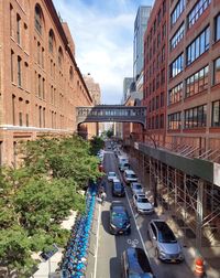 High angle view of street amidst buildings in city