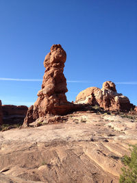 Rock formations against blue sky