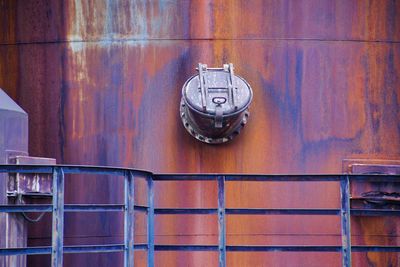 Close-up of telephone booth on wall