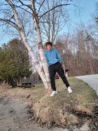 Full length of man standing on field