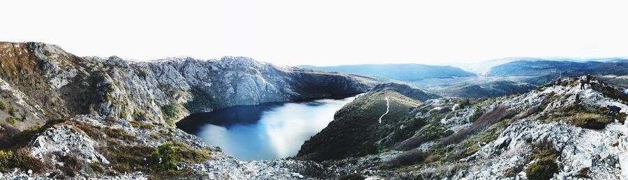 Panoramic view of mountains against clear sky