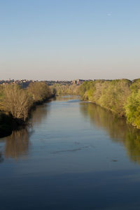Scenic view of stream against clear sky