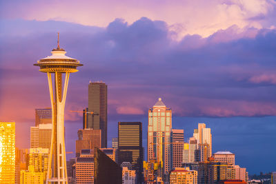 View of buildings against cloudy sky