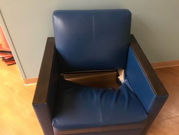 High angle view of empty chairs on table at home