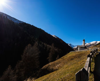 Low angle view of temple against clear blue sky