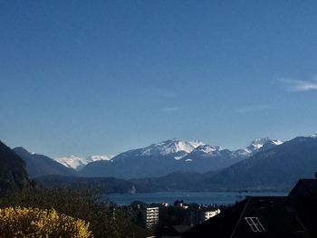 Scenic view of snowcapped mountains against sky