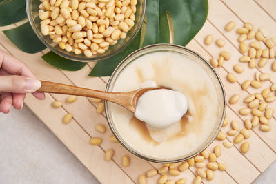 High angle view of person preparing food on table