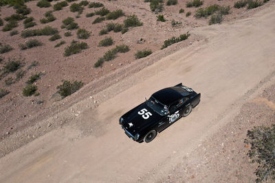 High angle view of car on sand at beach