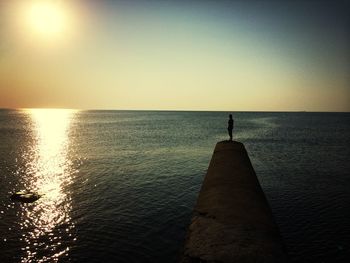 Scenic view of sea at sunset