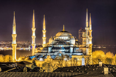 High angle view of illuminated buildings against sky