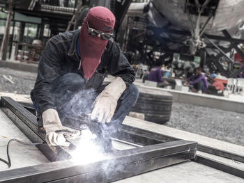 Man working on metal structure