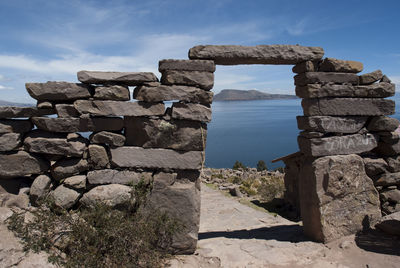 View of stone structure against sky