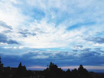 Silhouette trees against sky