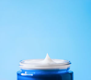 Close-up of dental equipment against blue background