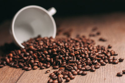 Close-up of coffee beans on table