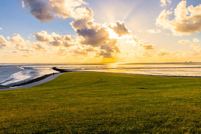 Scenic view of sea against sky during sunset