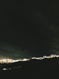 Scenic view of sea against sky at night