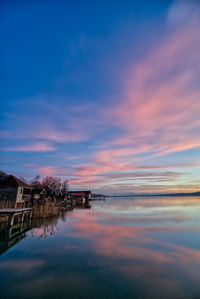 Scenic view of sea against sky at sunset