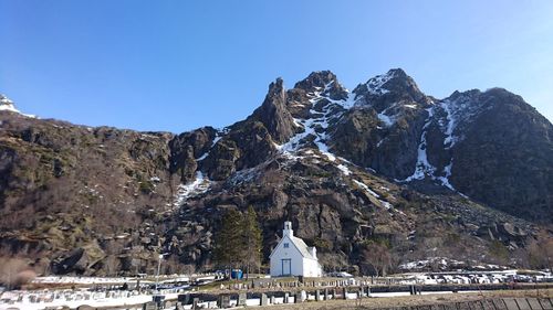 View of snow covered mountain against blue sky