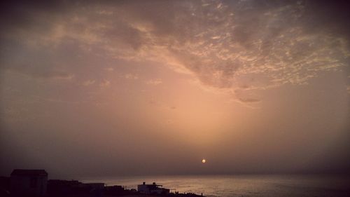 Scenic view of sea at sunset