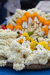 Close-up of white flowers for sale at market stall