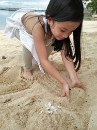 Full length of girl on beach