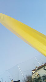 Yellow built structure against sky