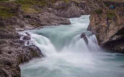 Lower waterfall below the more famous godafoss during an icelandic summer