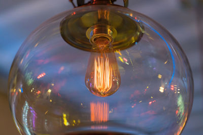 Close-up of light bulb in glass globe