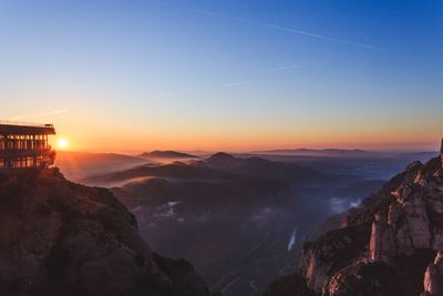 Panoramic view of landscape against clear sky during sunset