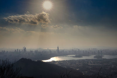 Panoramic view of buildings in city against sky