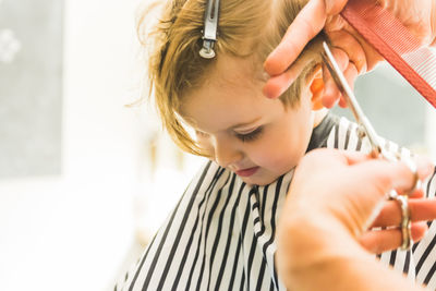 Boy getting haircut