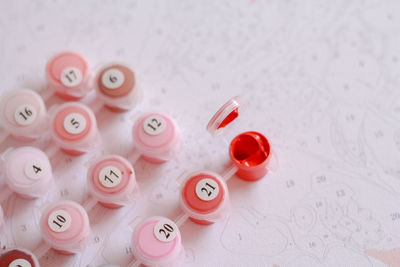 High angle view of various buttons on table