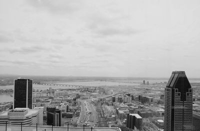 High angle view of buildings in city against sky