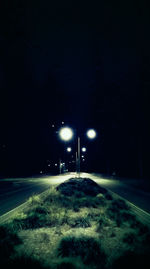 Street light on road in winter at night