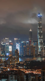 Illuminated buildings in city at night