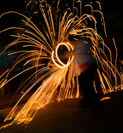 Firework display at night